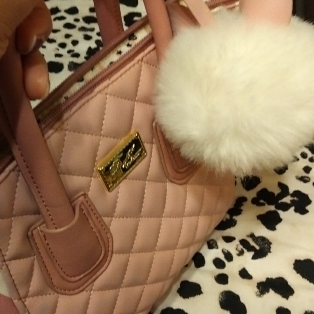 Iam selling my Betsey Johnson purse
